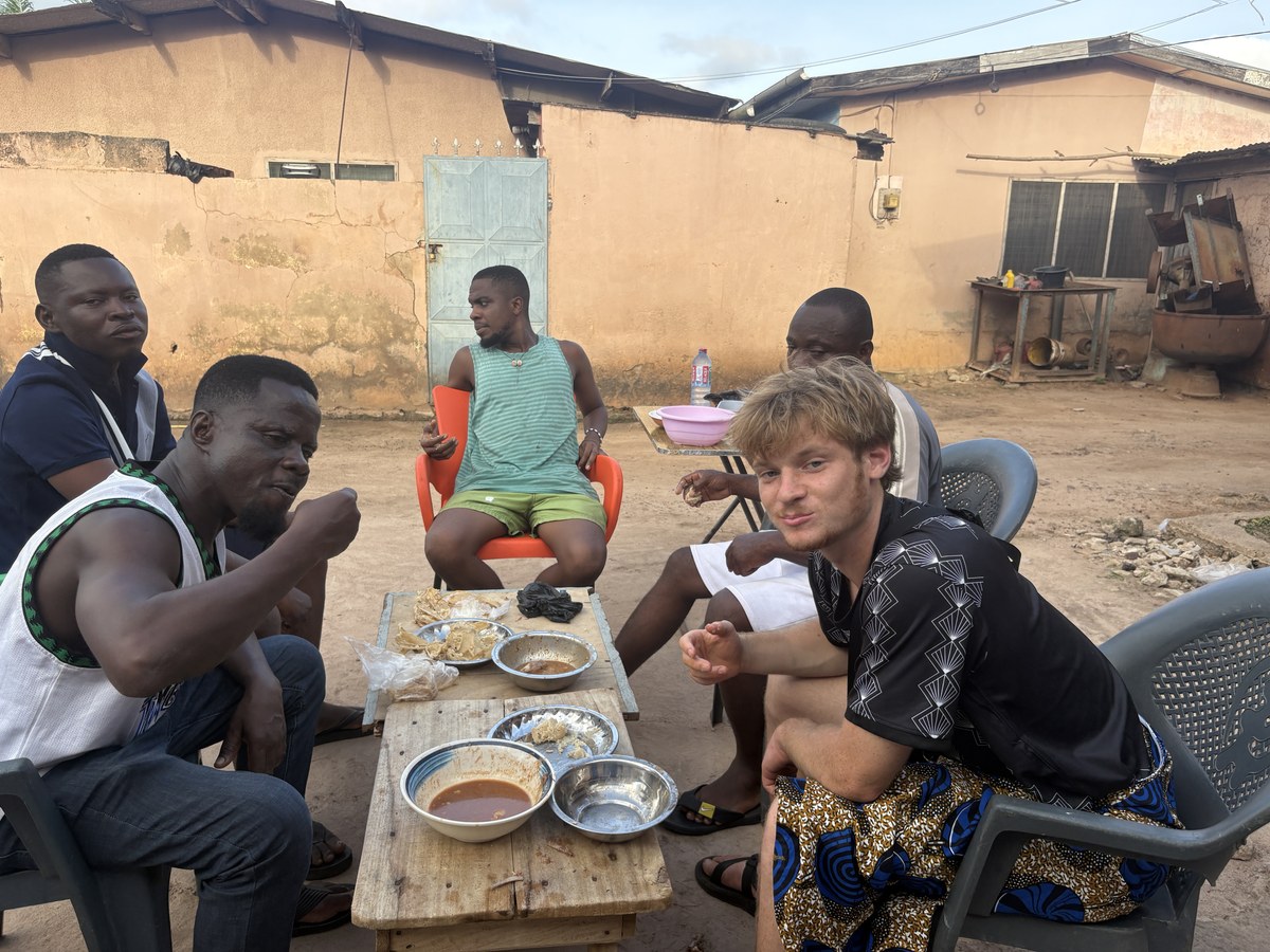 Having lunch with Emmanuel and his friends in Dzodze, Ghana.