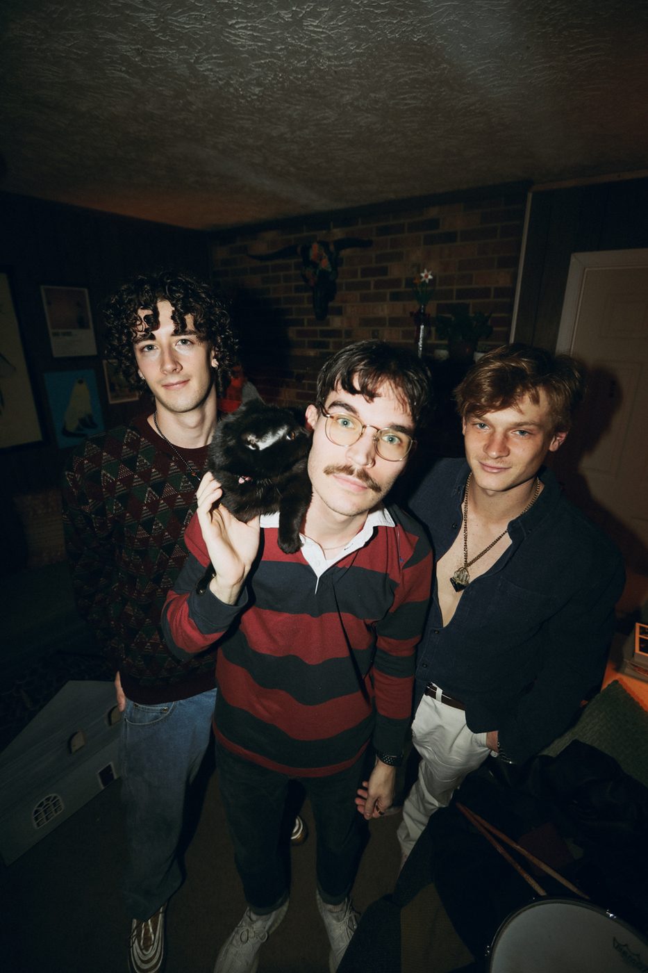 The three of us, one holding the black cat.