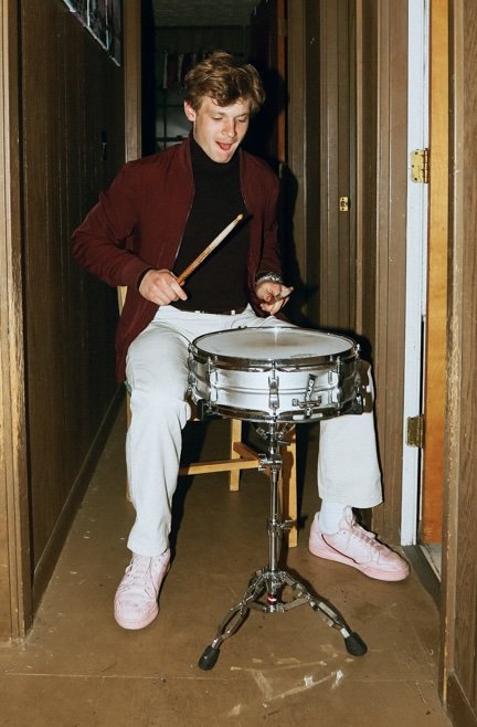 A snare-drum solo in the hallway.
